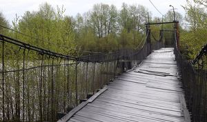 Нового подрядчика для строительства моста через реку Снежную определят в сентябре
